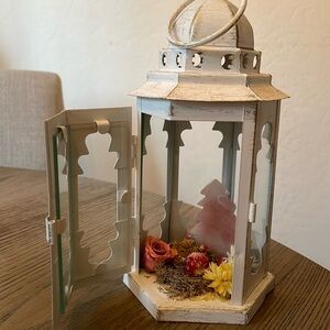 White lantern with crystals and dried flowers